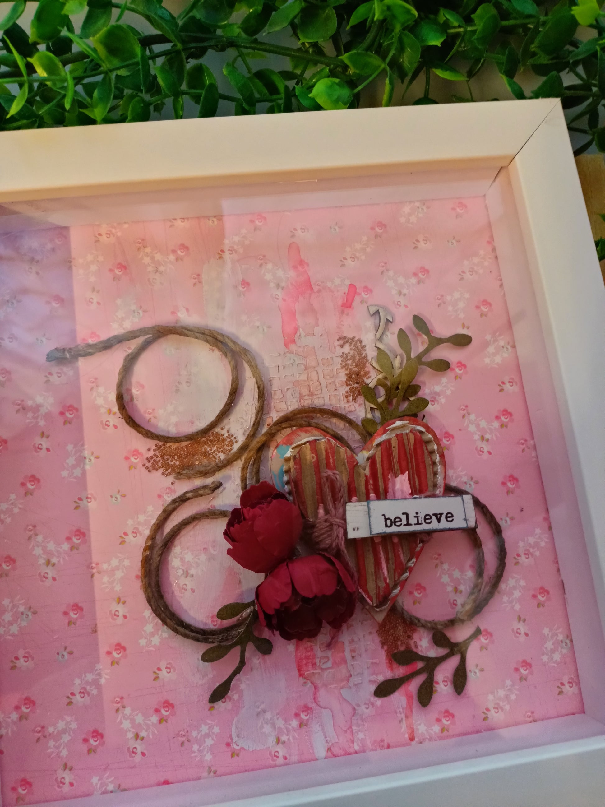 Mixed media frame with 'believe' message and heart motif