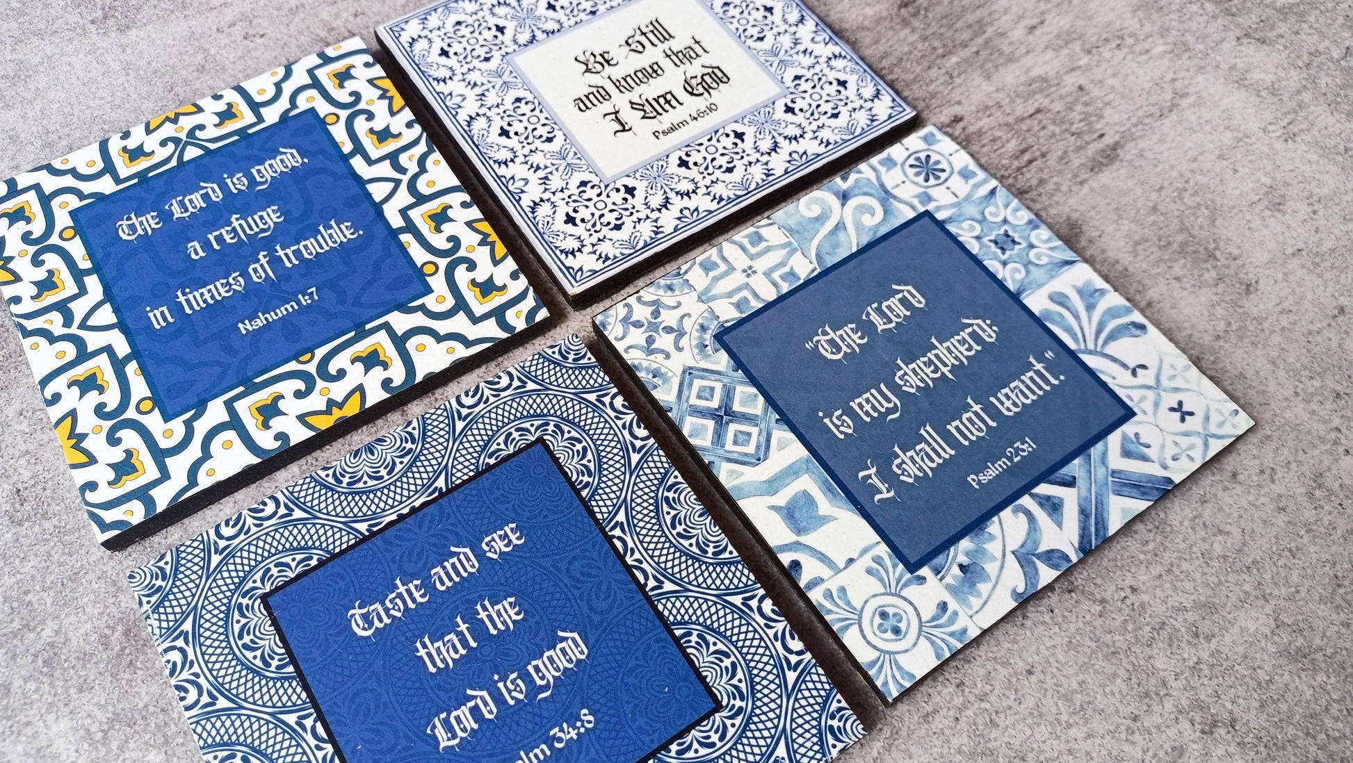 Close-up of Moroccan scripture coasters with blue designs