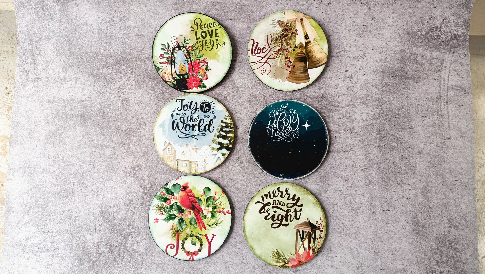 Assorted Christmas coasters with joyful messages