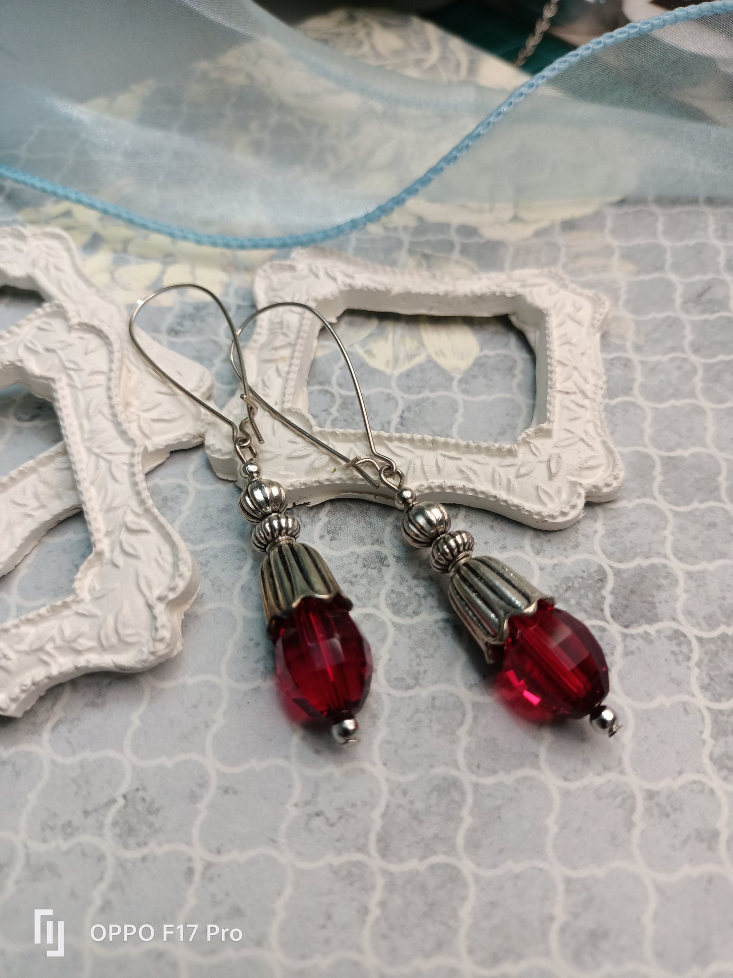 Red crystal beaded earrings with vintage style design