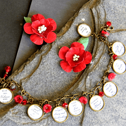 Scripture bracelet with red flowers and charms