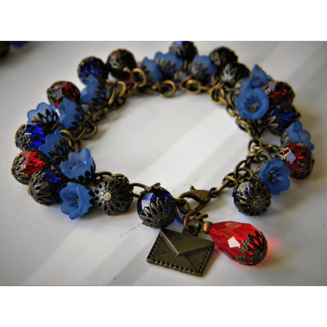 Vintage floral Efflorescence bracelet with blue and red beads