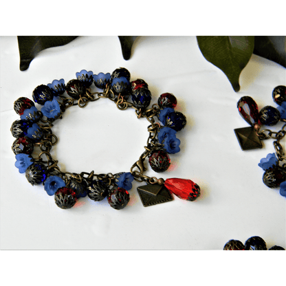 Handmade Efflorescence bracelet with floral charms and beads