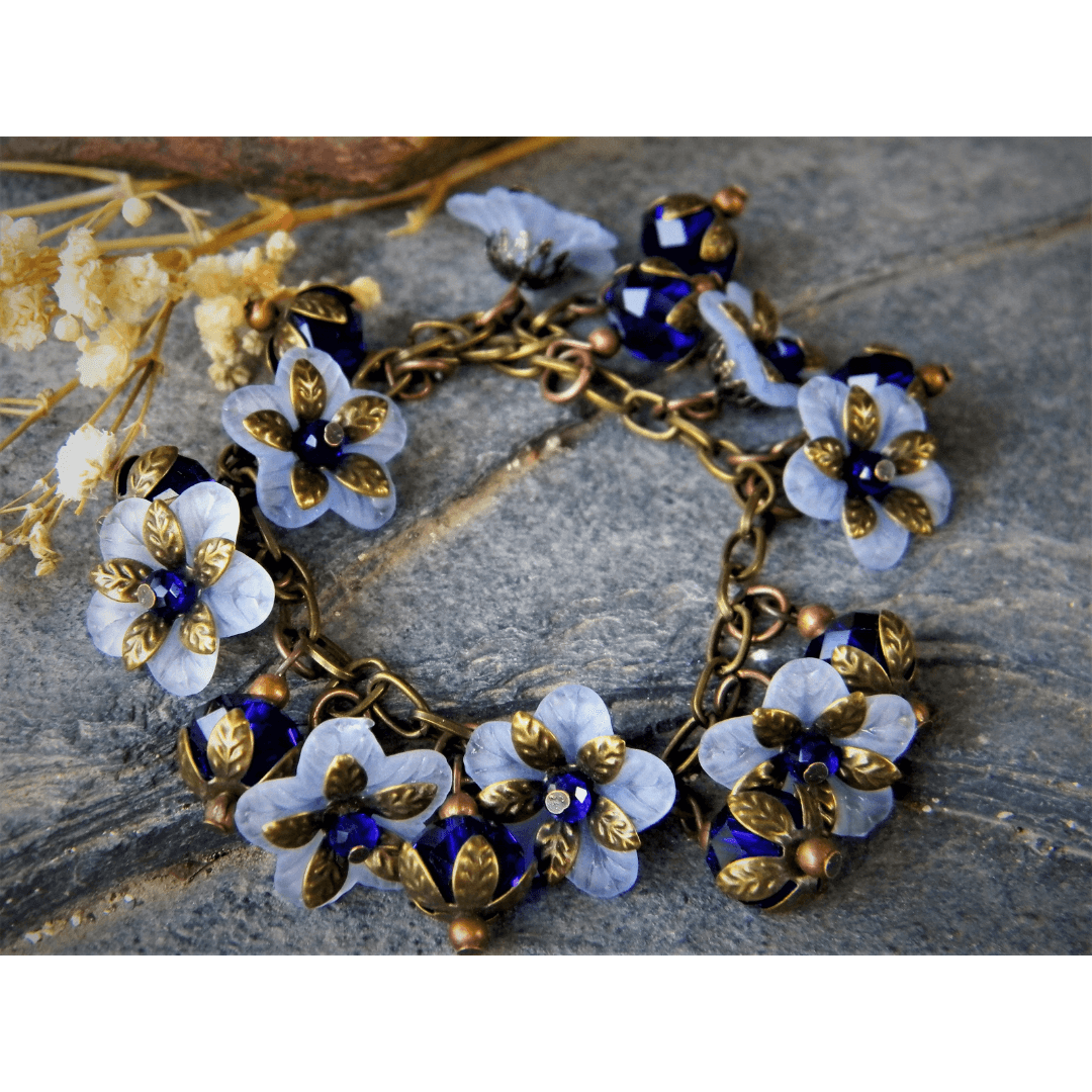 Vintage style bracelet with blue and white floral design.