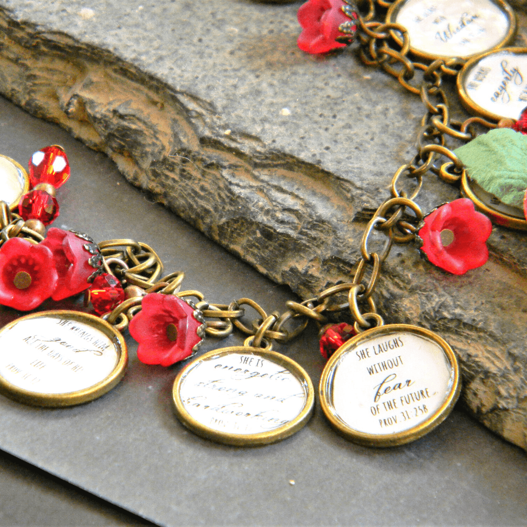 Close-up of scripture bracelet with floral accents